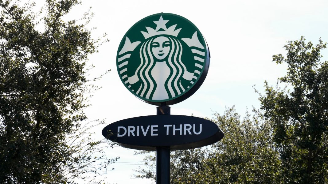 Starbucks workers kick off 65-store US strike on company’s busy Red Cup Day