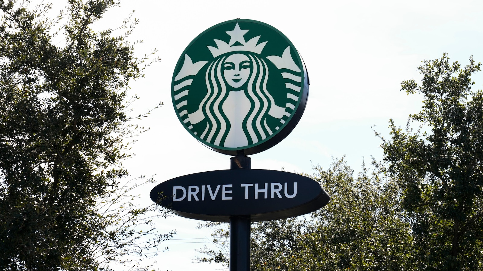 Starbucks workers kick off 65-store US strike on company's busy Red Cup Day