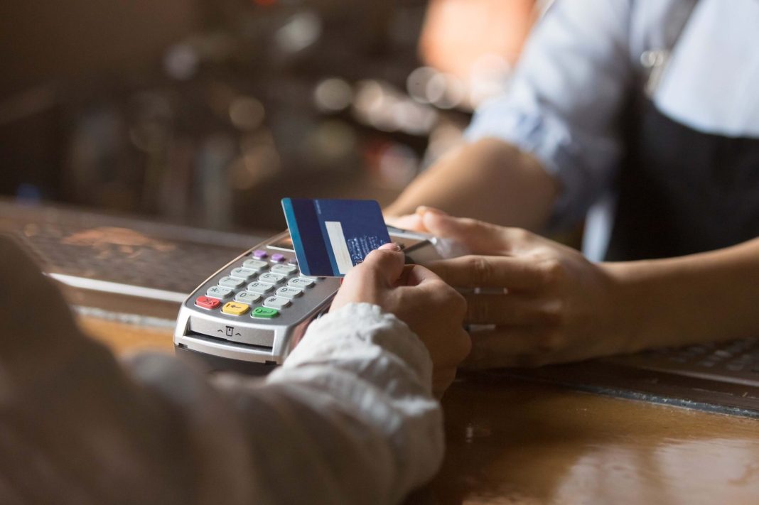 Fed releases report on debit card interchange fee revenue