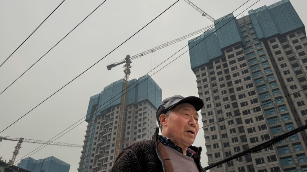 China's investment crash raises credit risks for homebuilders, banks, government: Fitch