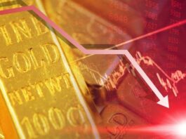 A gold bar with the red chart downward line showing gold price falls