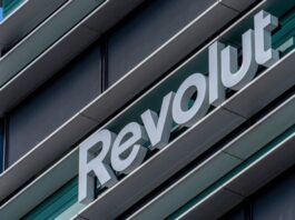 Revolut logo signboard on modern office building in Vilnius, Lithuania