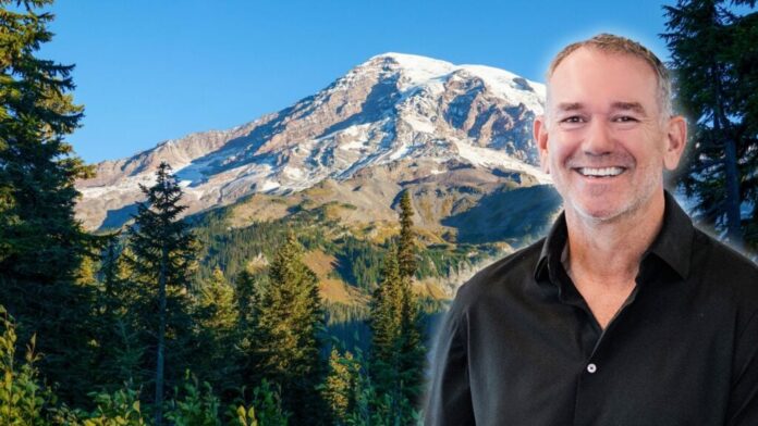An image of OB Jacobi in front of a Washington mountain to symbolize the Compass-NWMLS settlement.